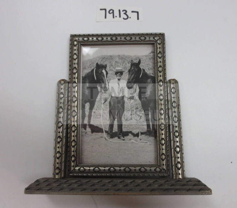 Silver painted, swiveled picture frame