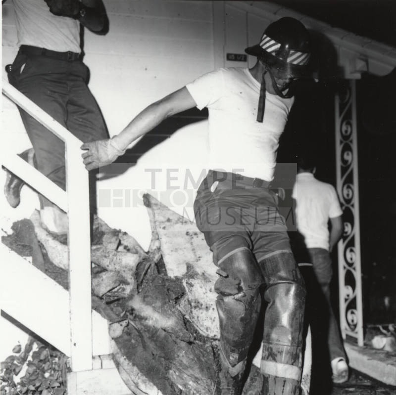 Henry Hammer Cleaning Up After Fire