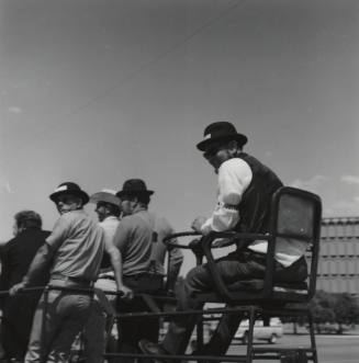 Man Steering People Mover