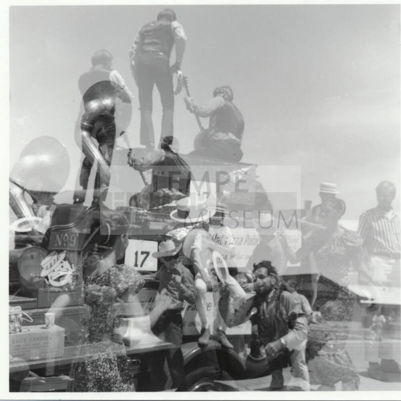 Barehanded Wolfchoker Association Band (double exposure) in the Tempe Centennial Parade