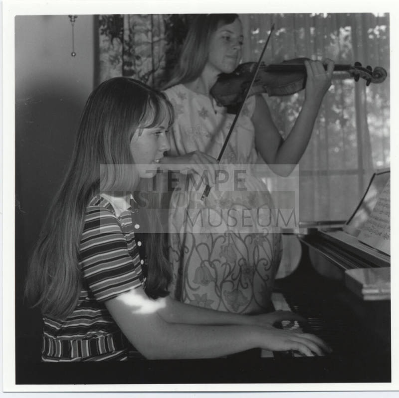 Young pianist and young violinist