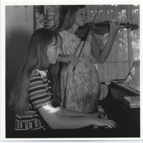 Young pianist and young violinist