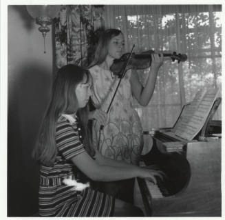 Young pianist and young violinist