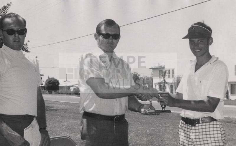 David Lawless Receives Golf Trophy