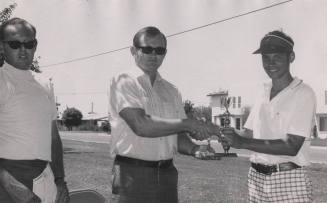 David Lawless Receives Golf Trophy