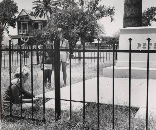 Three Girls Looking at Petersen Headstone