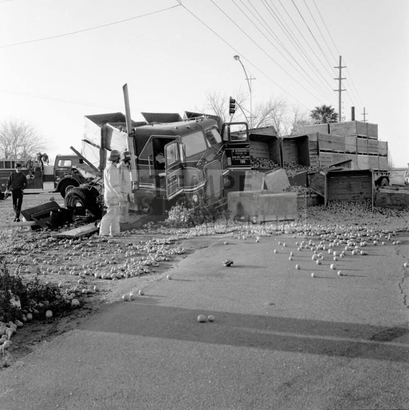 Truck Accident on Priest and Southern, Orange Squash all over road