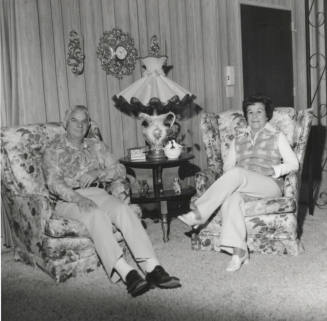 Unidentified Couple Sitting in Two Armchairs