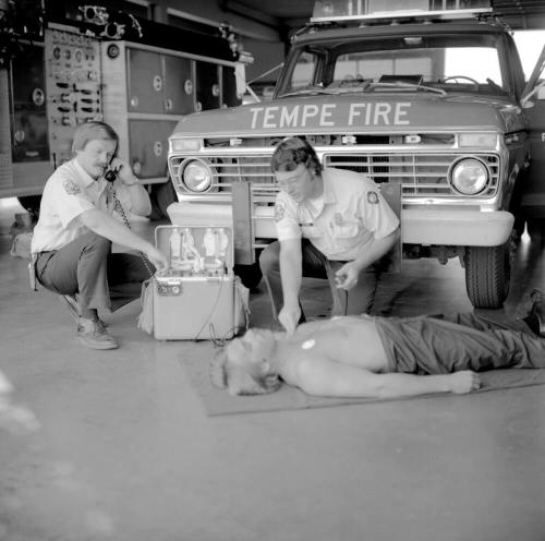 Tempe Fire Paramedics practice on fire engineer with "Telecare" unit