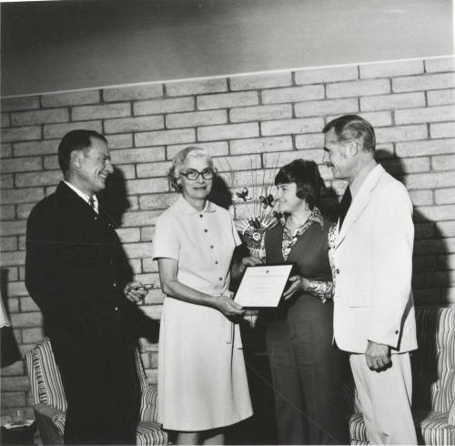 Red Cross Volunteer Effort Special Award is presented to Mrs. Marjorie Gray