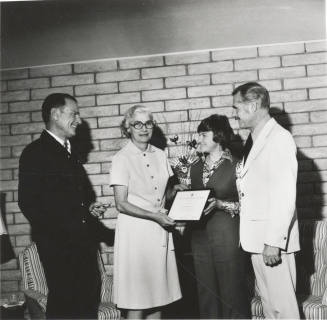 Red Cross Volunteer Effort Special Award is presented to Mrs. Marjorie Gray