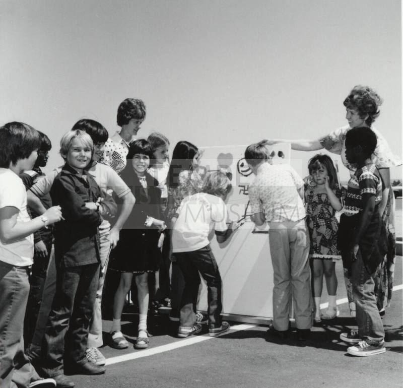Unidentified Group of Children & Two Adults
