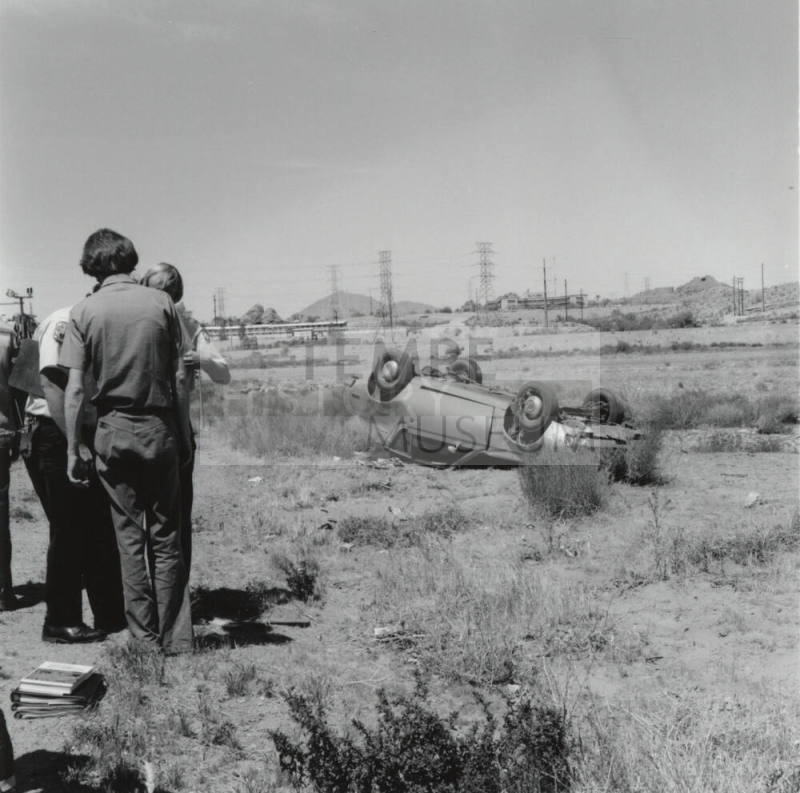 Car Flipped Over in Salt River Bed, North of Mill Ave. and 1st