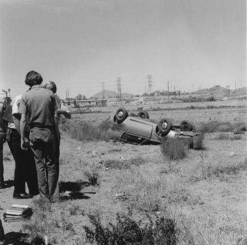 Car Flipped Over in Salt River Bed, North of Mill Ave. and 1st