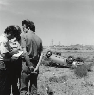 Car Flipped Over in Salt River Bed, North of Mill Avenue and 1st Street