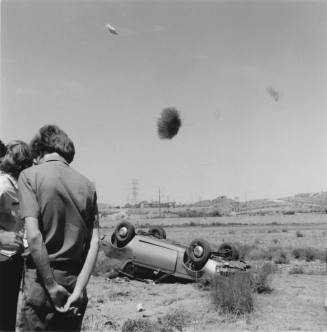 Car Flipped Over in Salt River Bed, North of Mill Avenue and 1st