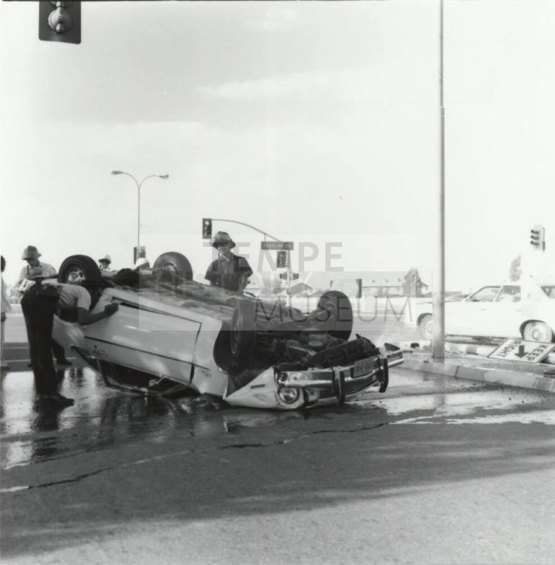 Car Overturns after hitting Median