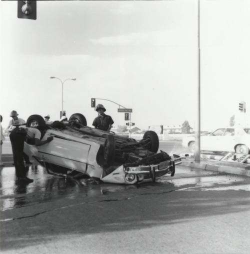 Car Overturns after hitting Median