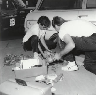 Boy on a Tricycle run over by a Car