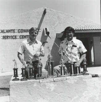 Line Up Of Trophies for First Annual League of United Latin American Citizens Golf Tournament - Tempe Daily News
