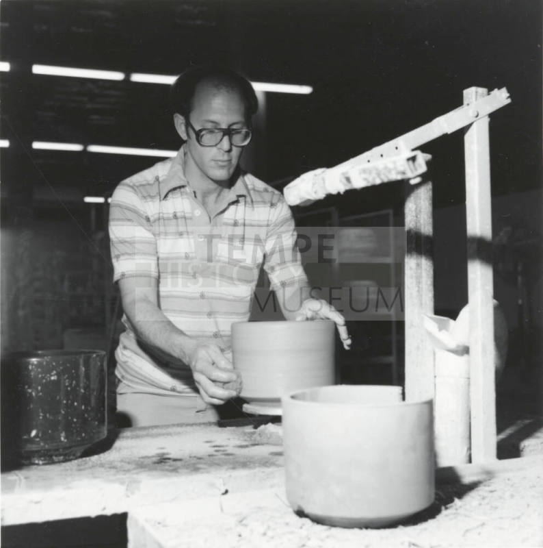 Unidentified picture with a man and a pottery wheel