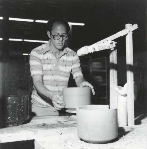 Unidentified picture with a man and a pottery wheel