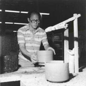 Unidentified picture with a man and a pottery wheel