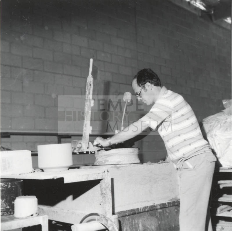 Unidentified picture with a man and a pottery wheel