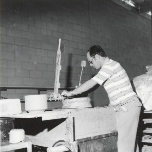 Unidentified picture with a man and a pottery wheel