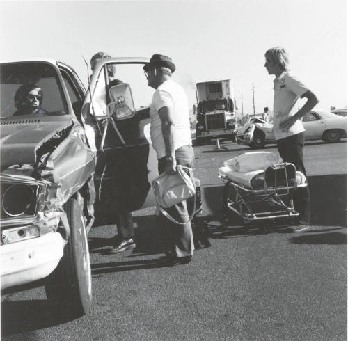 Auto Accident Involving Two Cars and a Semi-Truck