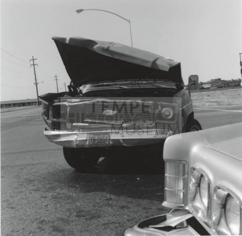 Wrecked Chevrolet car on Rural Road