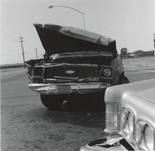 Wrecked Chevrolet car on Rural Road