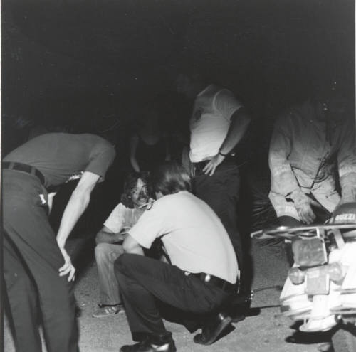 Rescue Officials With Man