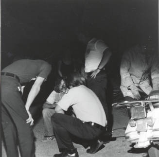 Rescue Officials With Man