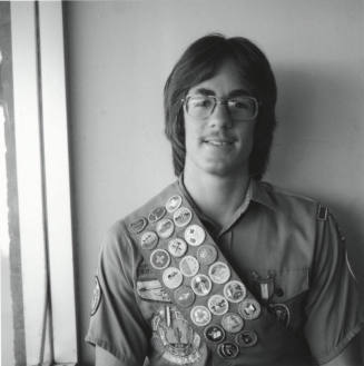 Man standing in Scout Uniform. - May 1977