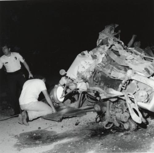 Crushed car. - May 1977