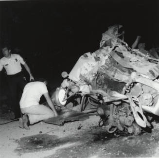 Crushed car. - May 1977