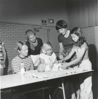 Center of Attention( Parks and Rec Babysitting class)-June 9, 1977