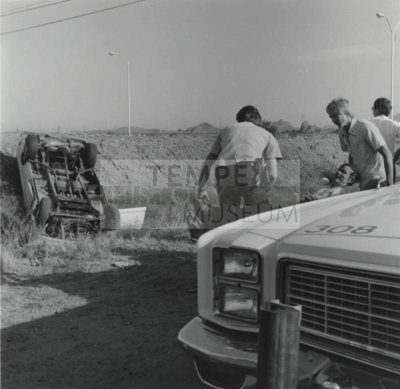 Roll-Over Accident, Injured Man and Woman - June 1977