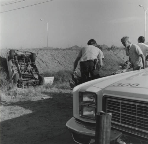 Roll-Over Accident, Injured Man and Woman - June 1977