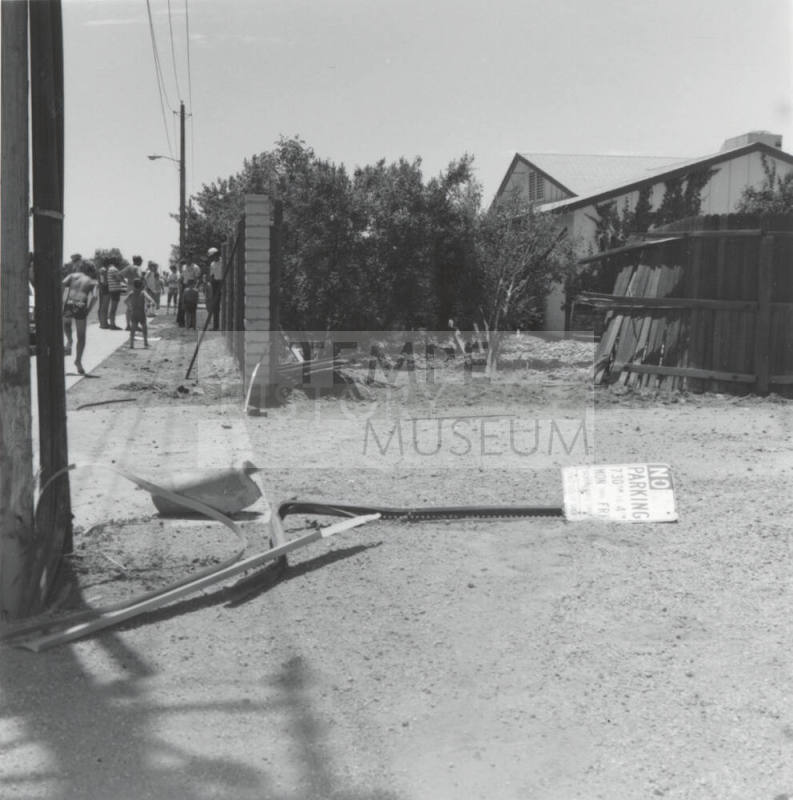 No parking sign plowed down by a car (photo3 of 4)-July 1977.
