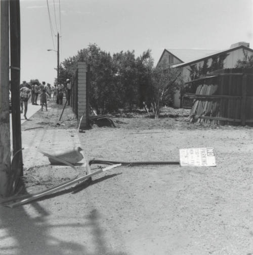 No parking sign plowed down by a car (photo3 of 4)-July 1977.