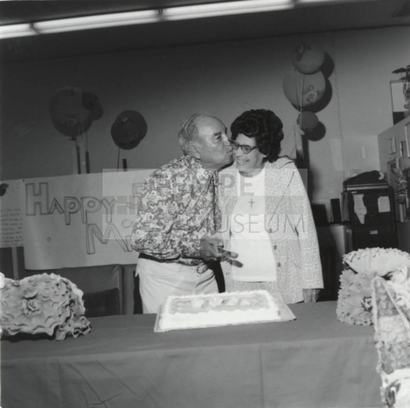 Unidentified Couple Celebrating With Cake - 1 of 3