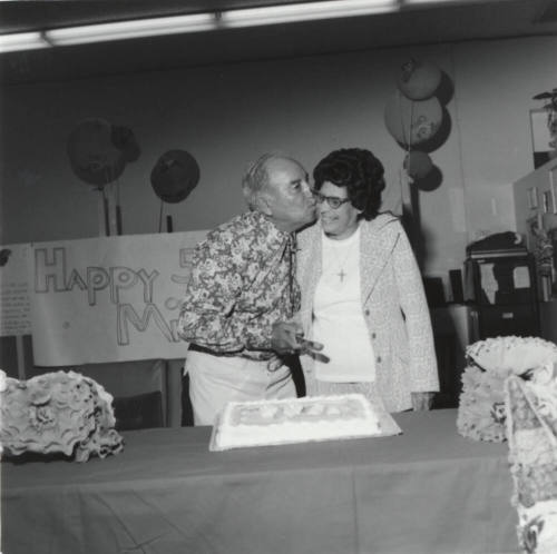 Unidentified Couple Celebrating With Cake - 1 of 3