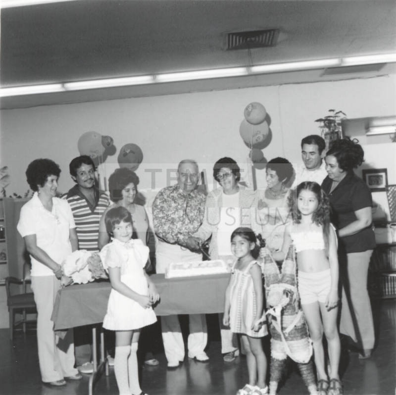 Unidentified Couple Celebrating With Cake  & Family - 3 of 3