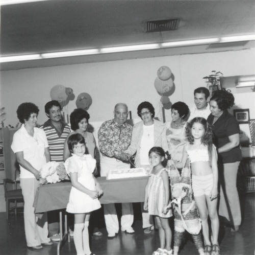 Unidentified Couple Celebrating With Cake  & Family - 3 of 3