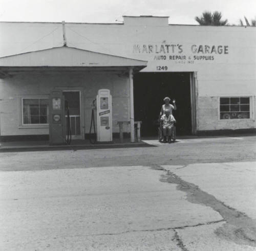 Marlatt's Garage & unidentified couple