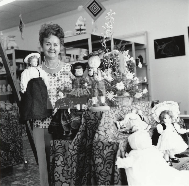 Unidentified Woman With Dolls