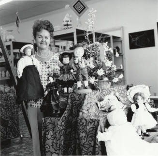 Unidentified Woman With Dolls
