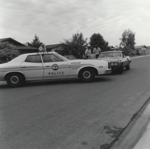 Sergeant Police with Unidentified Car